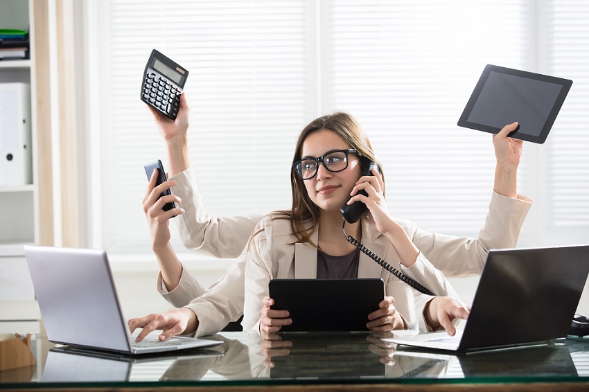 Women doing multiple things manually