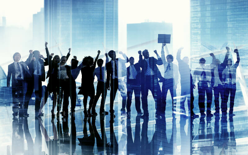 Group of business people showing victory sign